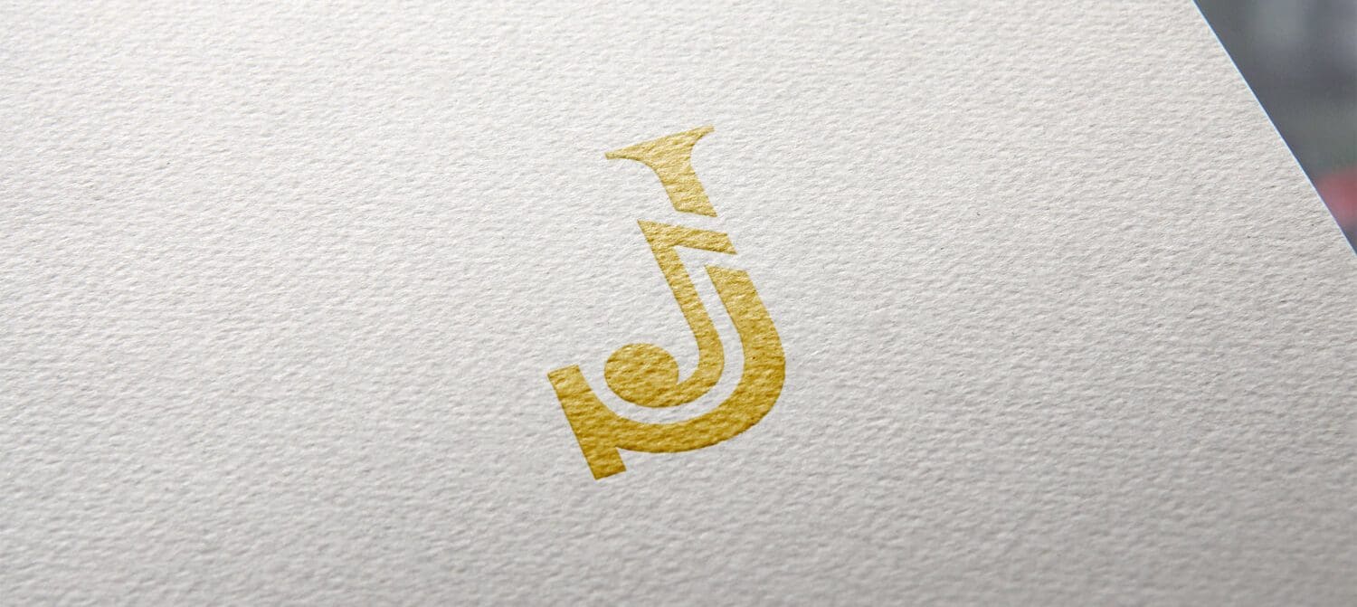 J monogram met muzieknoot logo